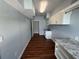 Laundry room features cabinets, granite countertop, sink, and bright lighting at 1328 Edgewater Beach Dr, Lakeland, FL 33805