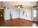 Living room features hardwood floors and built-in shelving at 1328 Edgewater Beach Dr, Lakeland, FL 33805