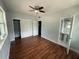 Spacious main bedroom boasting sleek laminate flooring, closet and ensuite access at 1328 Edgewater Beach Dr, Lakeland, FL 33805
