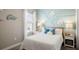 Nautical themed bedroom featuring neutral carpeting, a full size bed, and natural lighting at 1368 Melrose St, Lake Alfred, FL 33850