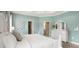 Bright bedroom features tray ceiling, comfortable bed, and stylish dresser, creating a relaxing space at 1368 Melrose St, Lake Alfred, FL 33850