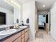 Bathroom with a double sink vanity and tile flooring at 1405 Clinton St, Bartow, FL 33830