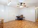 Bonus room features a desk and light wood flooring at 1405 Clinton St, Bartow, FL 33830