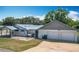 Spacious home with a two-car garage and fenced yard providing curb appeal and security at 1405 Clinton St, Bartow, FL 33830