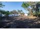Spacious backyard with potential for landscaping and outdoor activities in a private setting at 1507 Holly Rd, Lakeland, FL 33801