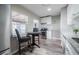 Bright kitchen with stainless steel appliances, granite countertops, and breakfast nook at 1507 Holly Rd, Lakeland, FL 33801