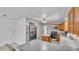 Spacious kitchen featuring stainless steel appliances, tile floors, wood cabinets and ample countertop space at 1507 Neptune Dr, Lakeland, FL 33801