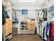 Walk-in closet with custom shelving and built-in storage, perfect for organization at 1516 Jae Pl, Lakeland, FL 33803