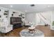 Cozy living room featuring built-in shelves, a piano, and comfortable seating at 1516 Jae Pl, Lakeland, FL 33803