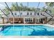 Relaxing screened pool and outdoor living space with brick patio; perfect for entertaining and enjoying outdoor living at 1516 Jae Pl, Lakeland, FL 33803