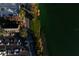 Aerial view showcases the building's location by the lake, surrounded by parking at 200 Lake Morton Dr # 100, Lakeland, FL 33801