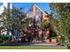 Elegant brick building showcases its architectural details and exterior landscaping at 200 Lake Morton Dr # 100, Lakeland, FL 33801