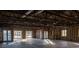 Large open interior area featuring exposed ceiling, multiple windows, and natural light at 200 Lake Morton Dr # 100, Lakeland, FL 33801