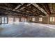 Expansive interior showcasing exposed ceiling elements, multiple windows offering abundant natural light at 200 Lake Morton Dr # 100, Lakeland, FL 33801