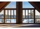 Stunning lake view from the expansive windows, creating a bright, airy interior at 200 Lake Morton Dr # 100, Lakeland, FL 33801