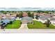 Charming single-story home with a well-manicured lawn and a paved driveway in a Gathering-friendly neighborhood at 2040 Chickadee St, Bartow, FL 33830