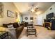 Spacious living room showcasing comfortable seating, an electric fireplace, and an open layout at 2040 Chickadee St, Bartow, FL 33830