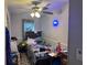 A comfortable bedroom with playful decor and a ceiling fan with lights at 208 Center St, Auburndale, FL 33823