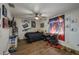 Whimsical bedroom with a ceiling fan, creative decorations, and comfortable furnishings at 2219 New Jersey Rd, Lakeland, FL 33803