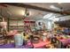 Spacious garage overwhelmed with excessive clutter, storage and household items at 2219 New Jersey Rd, Lakeland, FL 33803