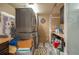 The laundry room is equipped with a stacked washer and dryer set to save space at 2219 New Jersey Rd, Lakeland, FL 33803