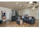 Comfortable living area features a large couch and several windows at 2219 New Jersey Rd, Lakeland, FL 33803
