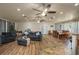 This open-concept living space combines areas for dining, lounging, and casual meals, creating a versatile and welcoming area at 2219 New Jersey Rd, Lakeland, FL 33803