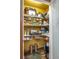 Walk-in pantry for storing food and cooking supplies at 2219 New Jersey Rd, Lakeland, FL 33803
