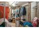 Spacious walk-in closet with abundant storage, shelving, and hanging space for an organized wardrobe at 2219 New Jersey Rd, Lakeland, FL 33803