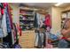 Organized walk-in closet with built-in shelving and ample hanging space at 2219 New Jersey Rd, Lakeland, FL 33803