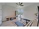A great exercise room with light flooring, modern ceiling fan and plenty of light at 2662 Delphi Hills Ct, Lakeland, FL 33812