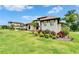 Charming curb view showcasing the house's architecture and design with a beautifully landscaped front yard at 2662 Delphi Hills Ct, Lakeland, FL 33812