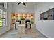 Office space features custom built-ins with accent lighting, two computer workstations, and neutral decor at 2662 Delphi Hills Ct, Lakeland, FL 33812