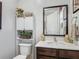 Bathroom featuring modern fixtures, vanity, and decorative accessories at 2683 Corvette Ln, Kissimmee, FL 34746