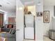 Convenient laundry closet with stacked washer and dryer units at 2683 Corvette Ln, Kissimmee, FL 34746