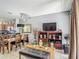 Living room with dining area combination, featuring modern furnishings and decor at 2683 Corvette Ln, Kissimmee, FL 34746