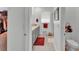 Bright bathroom offering a large vanity with storage, red accent towels, and a glass enclosed shower at 280 Pershing St, Bartow, FL 33830