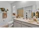 Neutral bathroom featuring vanity with a light countertop and modern fixtures at 280 Pershing St, Bartow, FL 33830