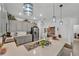Open kitchen featuring a large center island, stainless steel appliances, pendant lighting, and walk in pantry at 280 Pershing St, Bartow, FL 33830