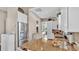 Well-equipped kitchen featuring granite countertops, stainless steel appliances, and ample storage at 3016 Wood Duck Dr, Polk City, FL 33868
