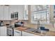 Well-equipped kitchen featuring granite countertops, stainless steel appliances, and ample storage at 3016 Wood Duck Dr, Polk City, FL 33868