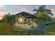 Inviting outdoor Florida room with comfortable seating and serene landscape views, perfect for relaxation at 3016 Wood Duck Dr, Polk City, FL 33868