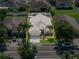 A beautiful aerial view of a single-Gathering home with a manicured lawn and well-maintained landscaping at 3873 Hampton Hills Dr, Lakeland, FL 33810