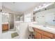 Bright bathroom with separate shower and tub, double sink vanity, and natural light at 3873 Hampton Hills Dr, Lakeland, FL 33810