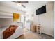 This cozy bedroom features bunkbeds, dresser, television and stylish decor at 3873 Hampton Hills Dr, Lakeland, FL 33810