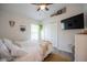 Comfortable bedroom features a TV and stylish decor, perfect for relaxing at 3873 Hampton Hills Dr, Lakeland, FL 33810