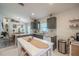 Charming kitchen featuring granite counters, stainless steel appliances, and views of the dining room at 3873 Hampton Hills Dr, Lakeland, FL 33810