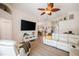 Spacious living room featuring vaulted ceilings, a ceiling fan, and stylish, comfortable furniture at 3873 Hampton Hills Dr, Lakeland, FL 33810