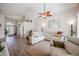 Inviting living room showcasing a stylish ceiling fan, and a cozy layout connected to the foyer at 3873 Hampton Hills Dr, Lakeland, FL 33810