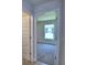 View into a bedroom with plush carpeting at 4019 Tullamore Ln, Auburndale, FL 33823